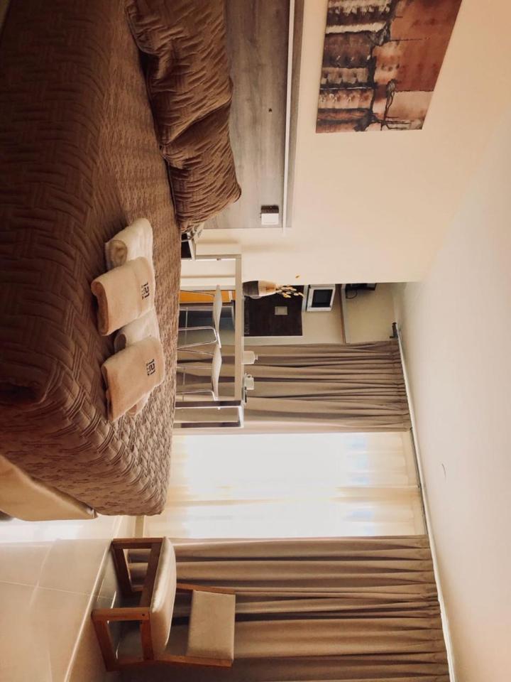 Illia 121 Apart Hotel Неукен Екстер'єр фото